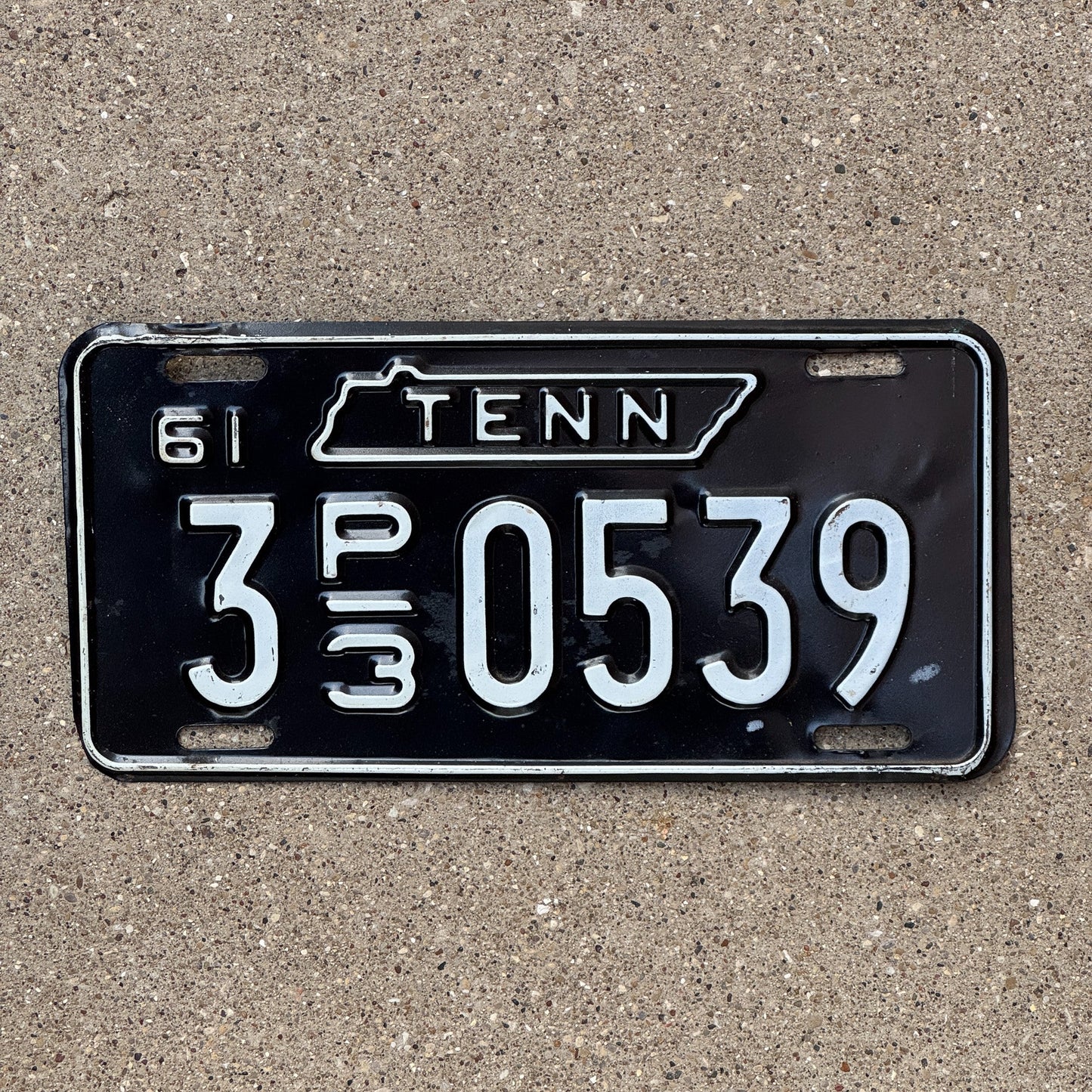 Photo of a 1961 Tennessee Truck License Plate Auto Tag Garage Decor Vintage 3 P3 0539