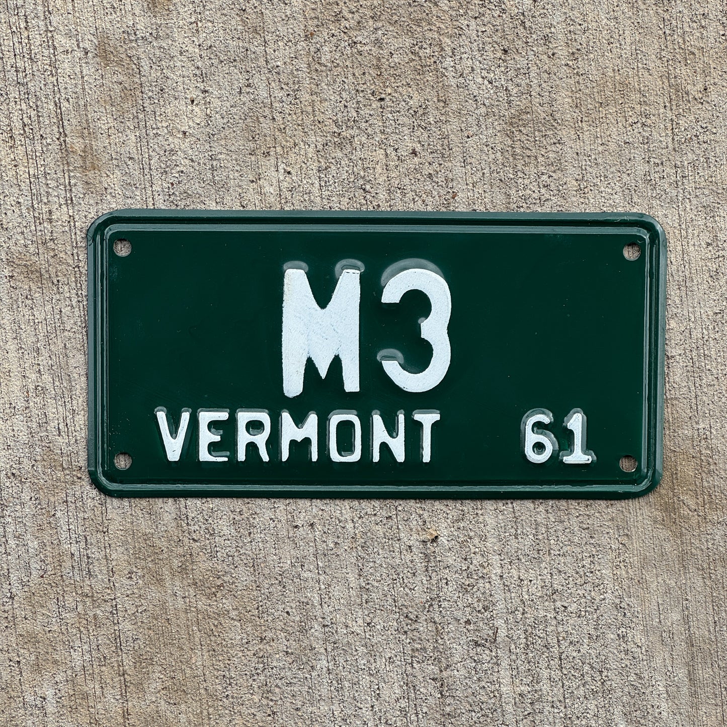 Photo of a 1961 Vermont Motorcycle License Plate Auto Tag 2 Vintage Garage Low Number Single Digit M 3 with original patina
