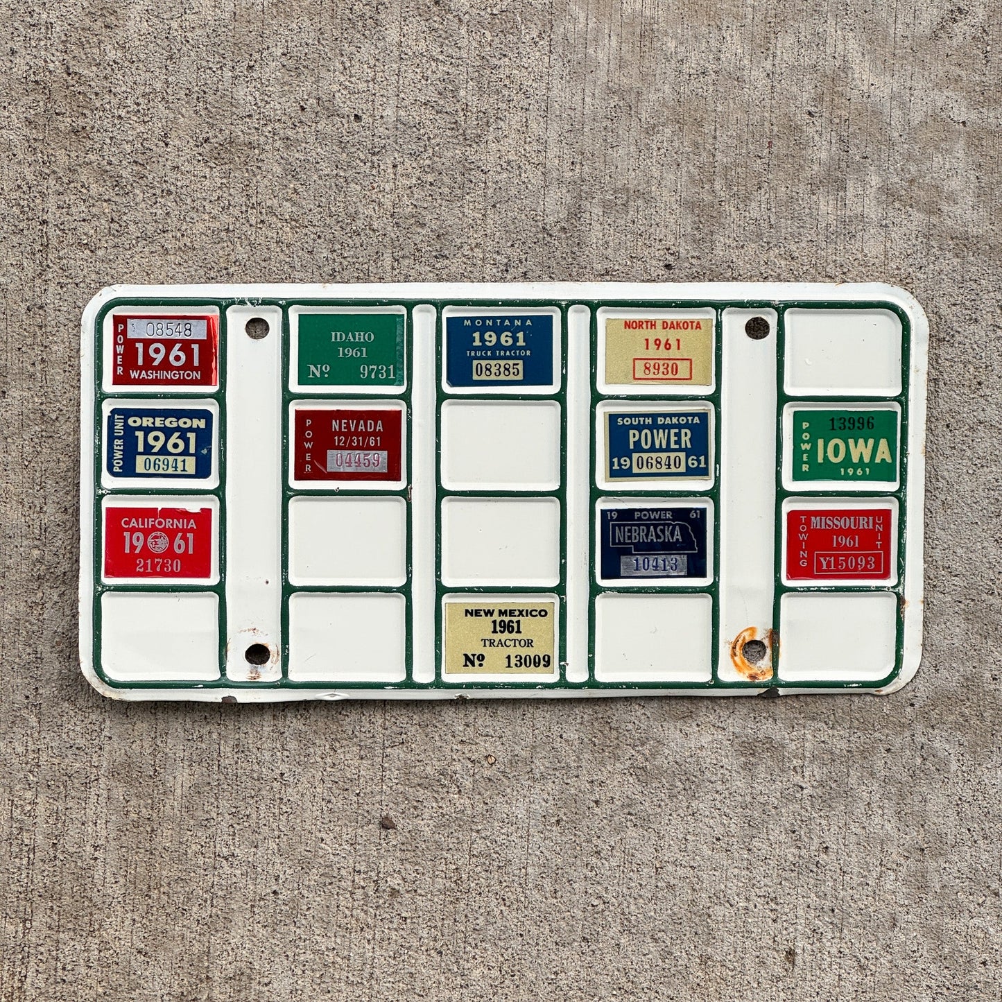 Photo of a 1961 Washington Reciprocity Prorate Bingo Sticker License Plate Auto Tag 2 Vintage Garage with original patina