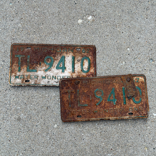 Photo of a 1962 1964 Michigan License Plate Pair Auto Tag Garage Decor Vintage TL 9410 with original patina