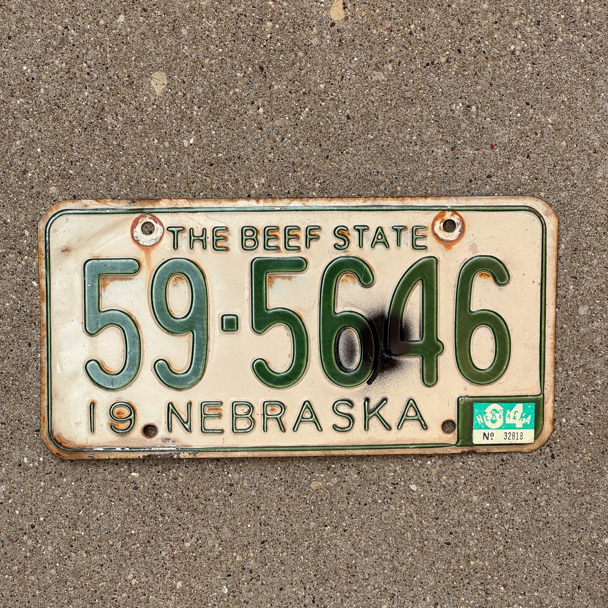 Photo of a 1962 1964 Nebraska License Plate Auto Tag Garage Decor Vintage Beef State 59 5646 with original patina