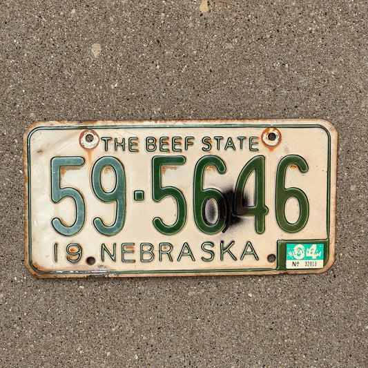 Photo of a 1962 1964 Nebraska License Plate Auto Tag Garage Decor Vintage Beef State 59 5646 with original patina