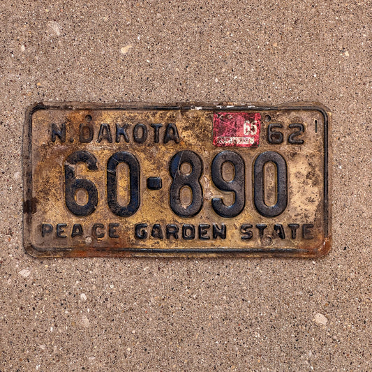 Photo of a 1962 1965 North Dakota License Plate Auto Tag Garage Decor Vintage 60 890 with original patina
