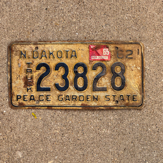 Photo of a 1962 1965 North Dakota Truck License Plate Auto Tag Garage Decor Vintage 23828 with original patina