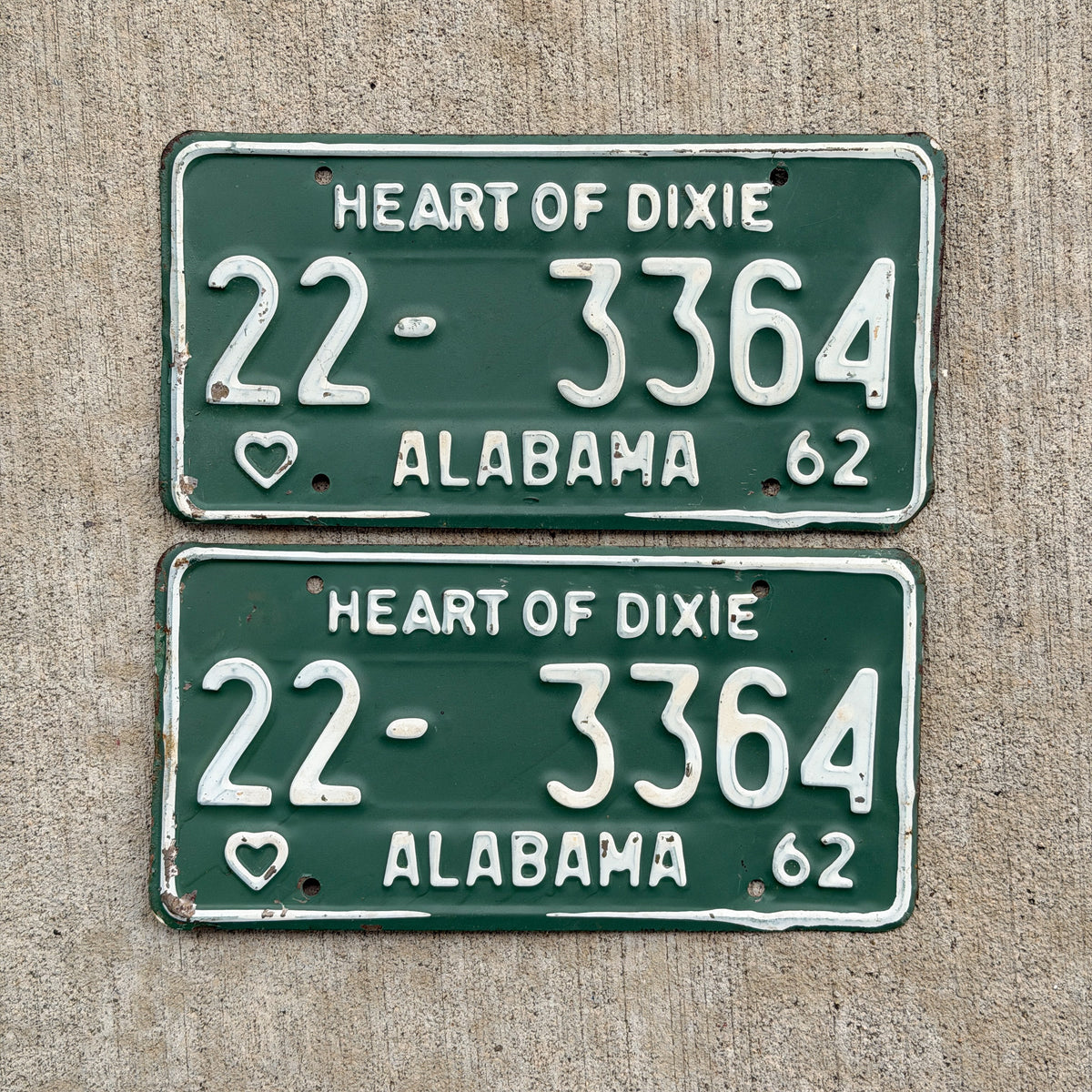 Photo of a 1962 Alabama License Plate Pair Auto Tag Garage Decor Vintage Heart of Dixie Coosa County 22 3364 with original patina