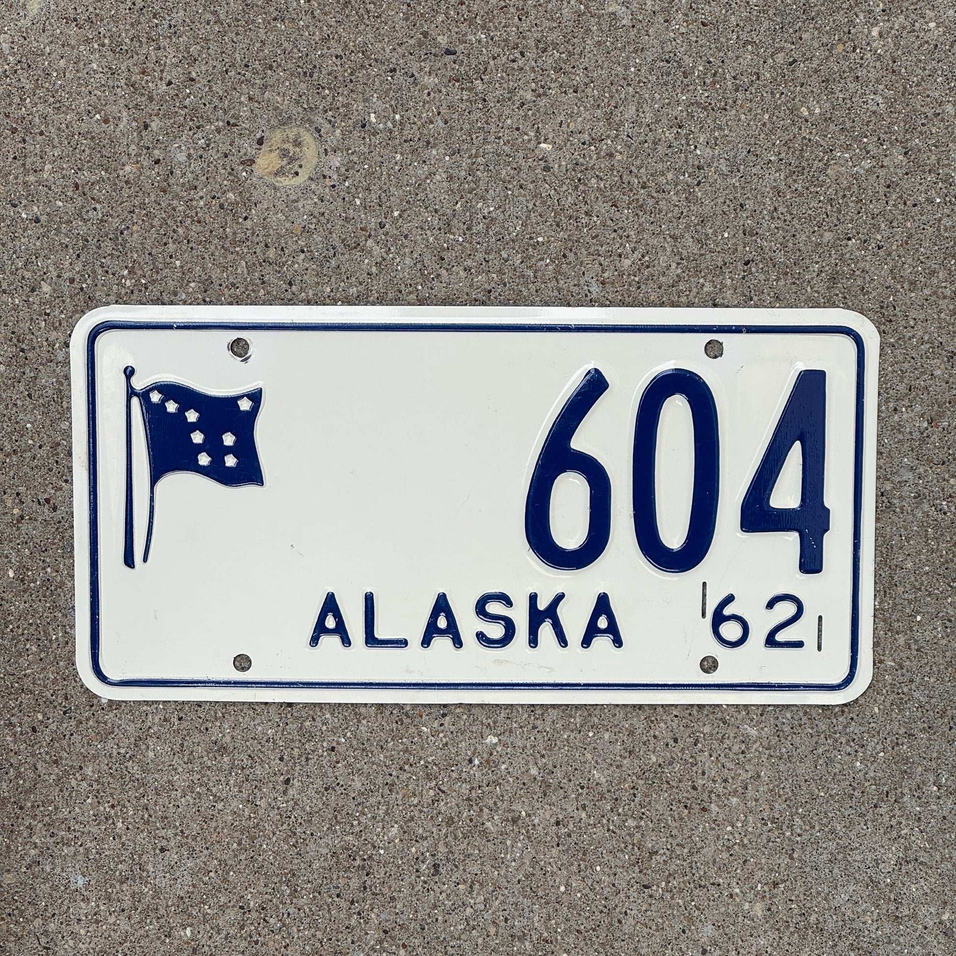 Photo of a 1962 Alaska License Plate Auto Tag Garage Decor Vintage Low Number Three Digit 604 with original patina