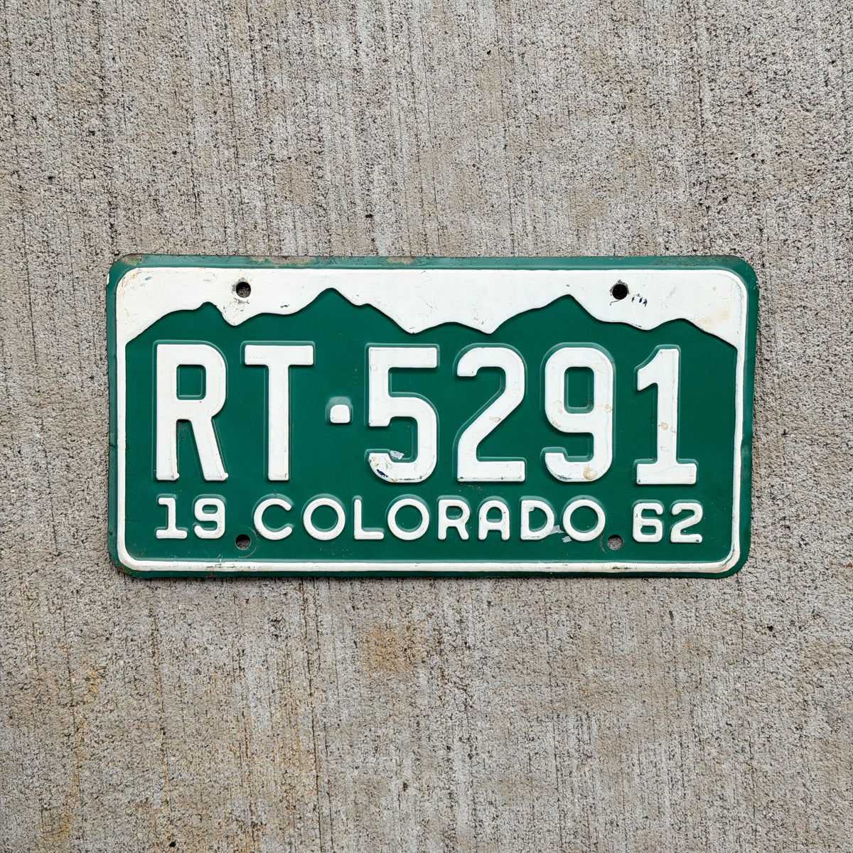 Photo of a 1962 Colorado License Plate Auto Tag Garage Decor Vintage RT 5291 with original patina