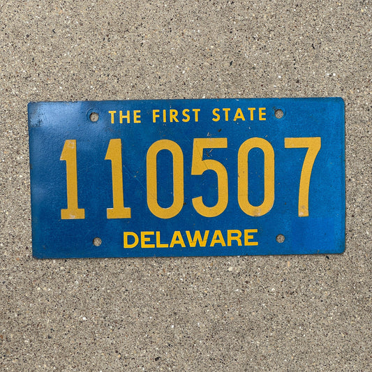 Photo of a 1962 Delaware License Plate Auto Tag Garage Decor Vintage Riveted 110507