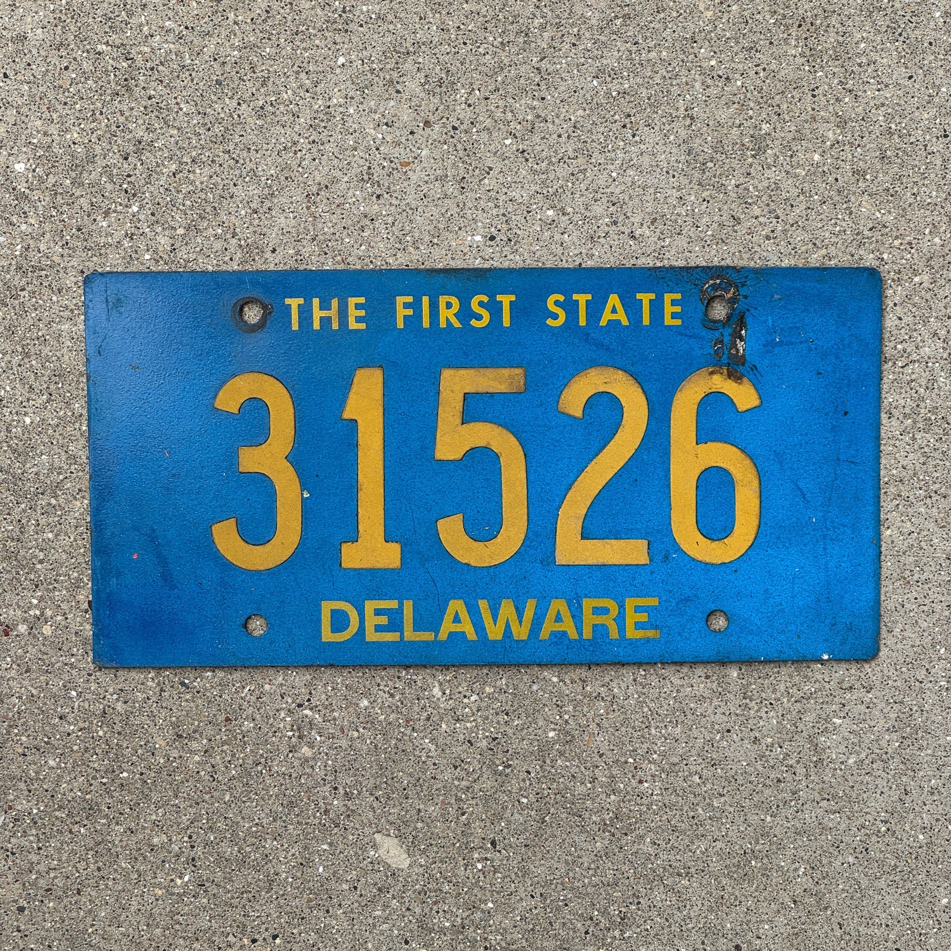 Photo of a 1962 Delaware License Plate Auto Tag Garage Decor Vintage Riveted 31526