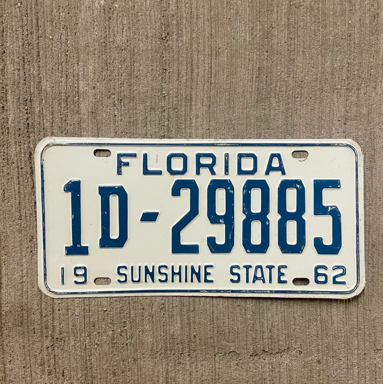 Photo of a 1962 Florida License Plate Auto Tag Garage Decor Vintage Dade County 1 D 29885 with original patina
