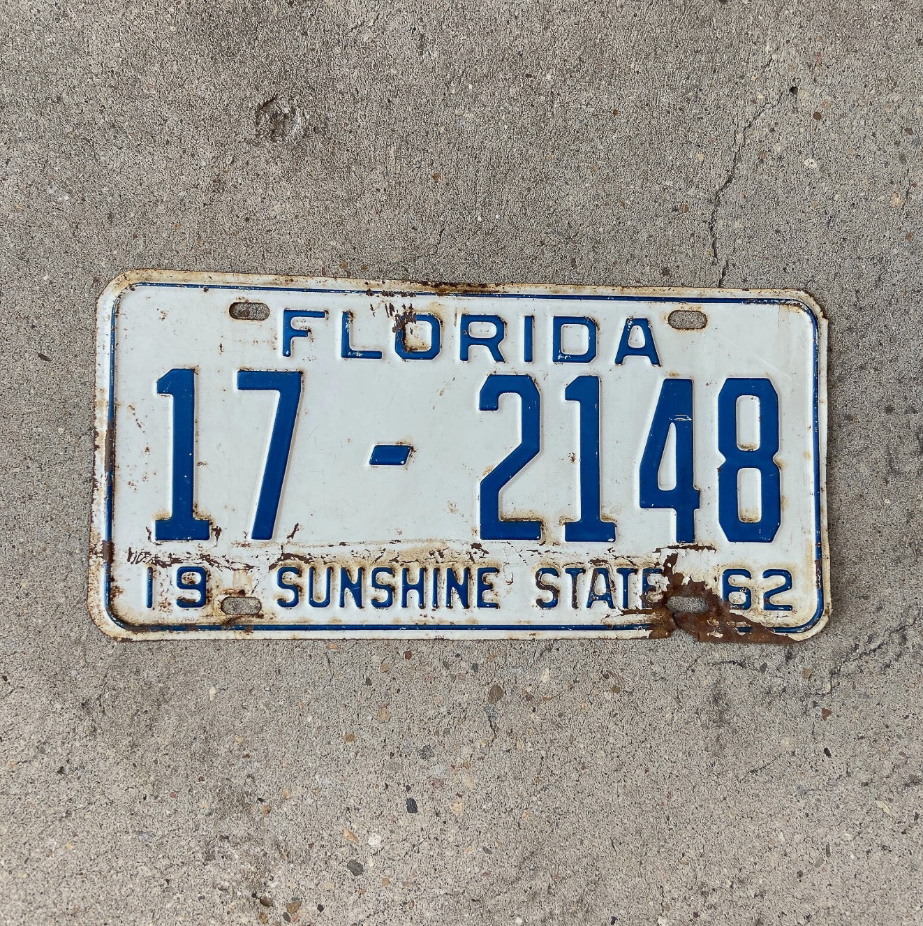 Photo of a 1962 Florida License Plate Auto Tag Garage Decor Vintage Seminole County 17 2148 with original patina