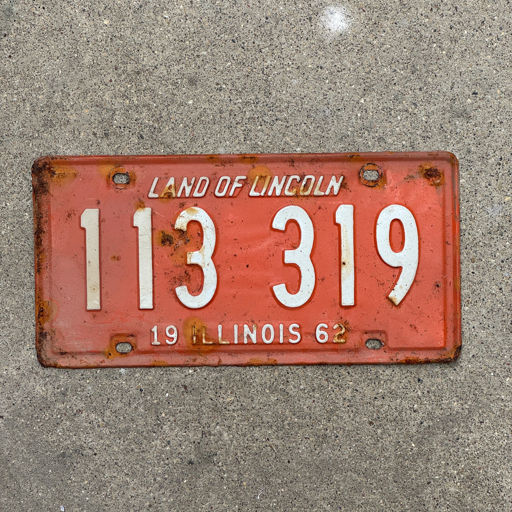 Photo of a 1962 Illinois License Plate Auto Tag 1 Vintage Garage 113 319 with original patina