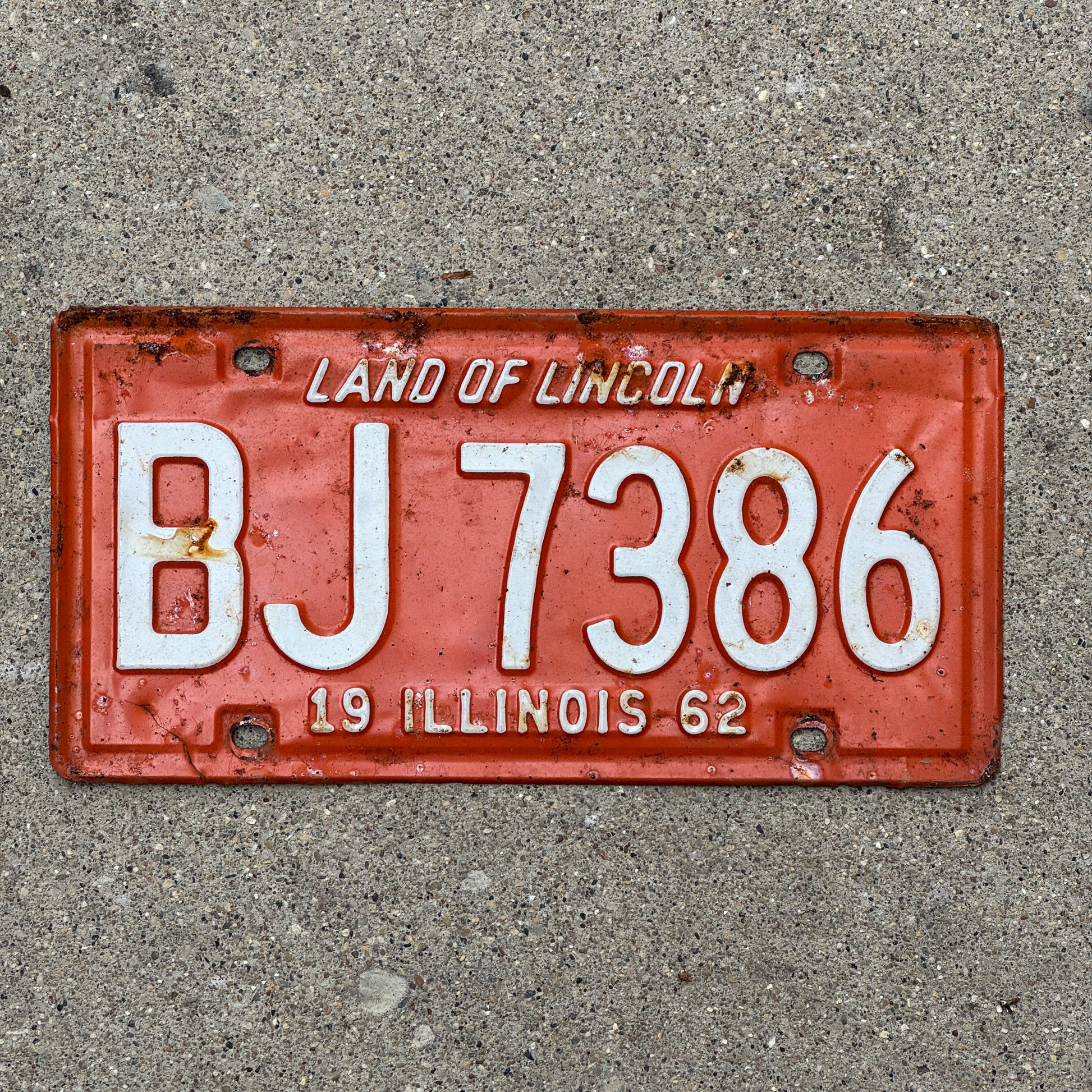 Photo of a 1962 Illinois License Plate Auto Tag 1 Vintage Garage BJ 7386 with original patina