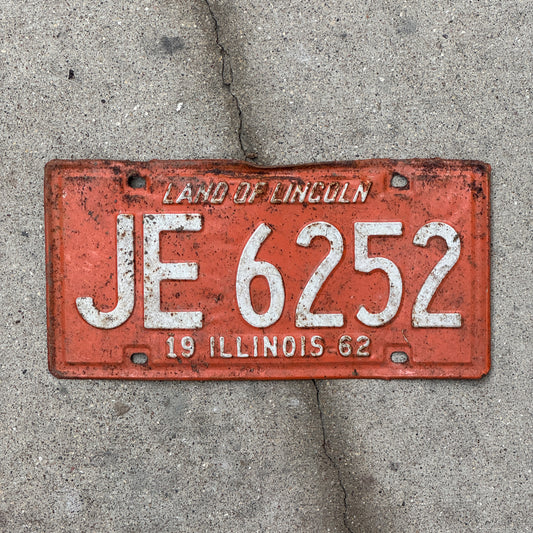 Photo of a 1962 Illinois License Plate Auto Tag 1 Vintage Garage JE 6252 with original patina