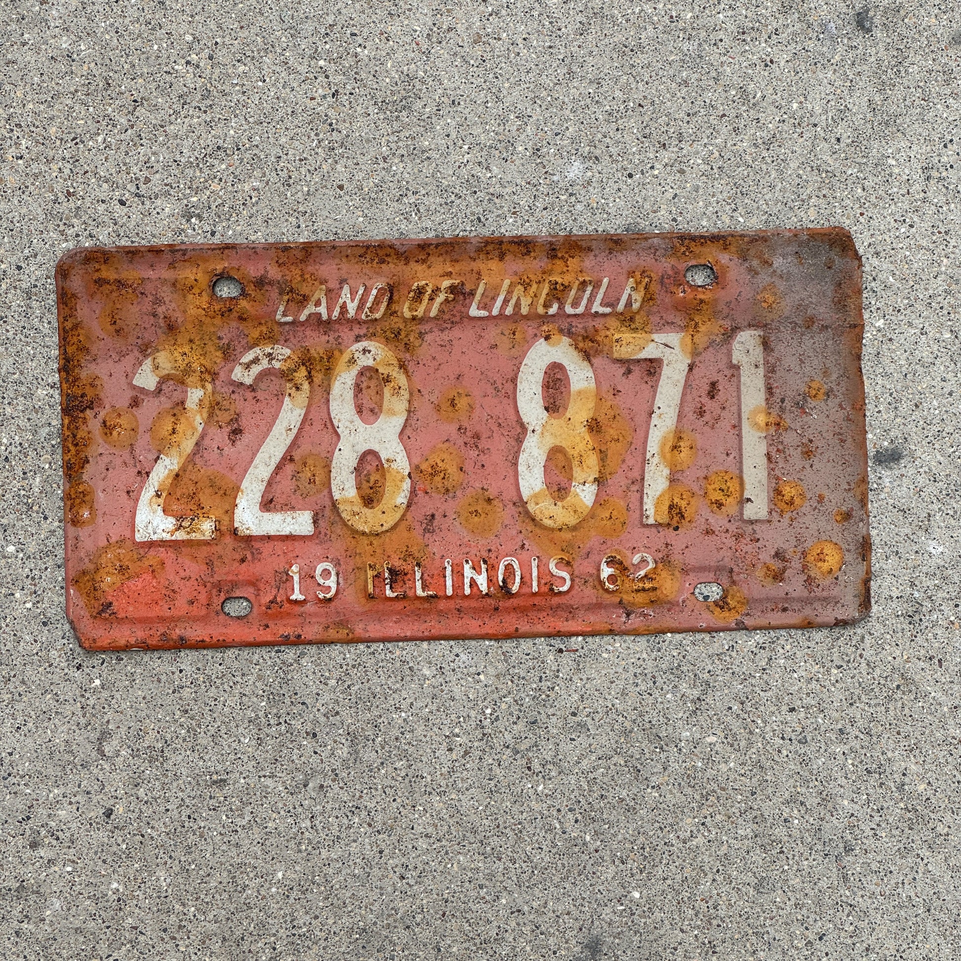 Photo of a 1962 Illinois License Plate Auto Tag 2 Vintage Garage 228 871 with original patina