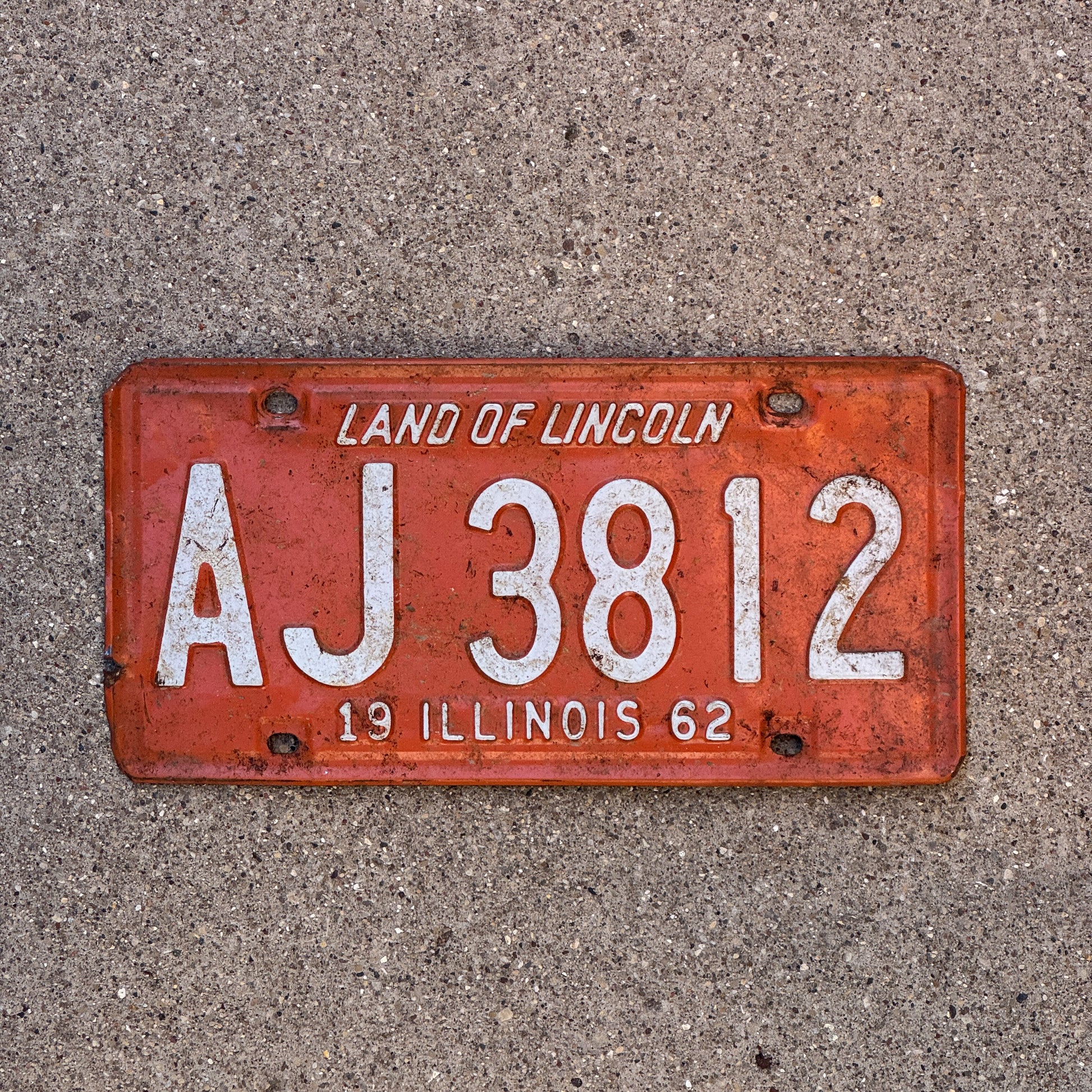 Photo of a 1962 Illinois License Plate Auto Tag 2 Vintage Garage AJ 3812 with original patina