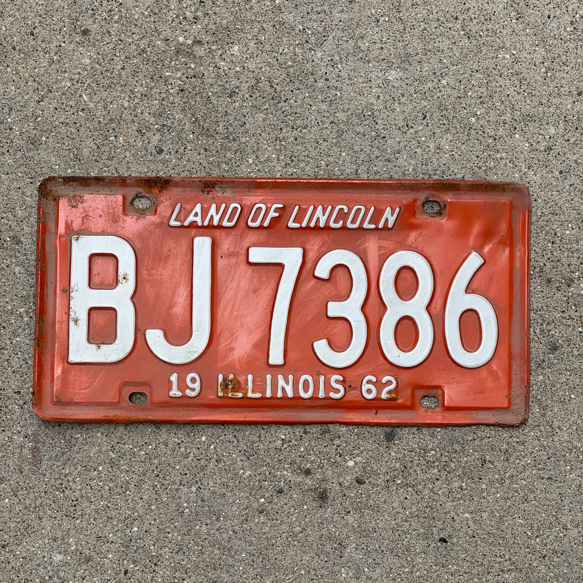Photo of a 1962 Illinois License Plate Auto Tag 2 Vintage Garage BJ 7386 with original patina