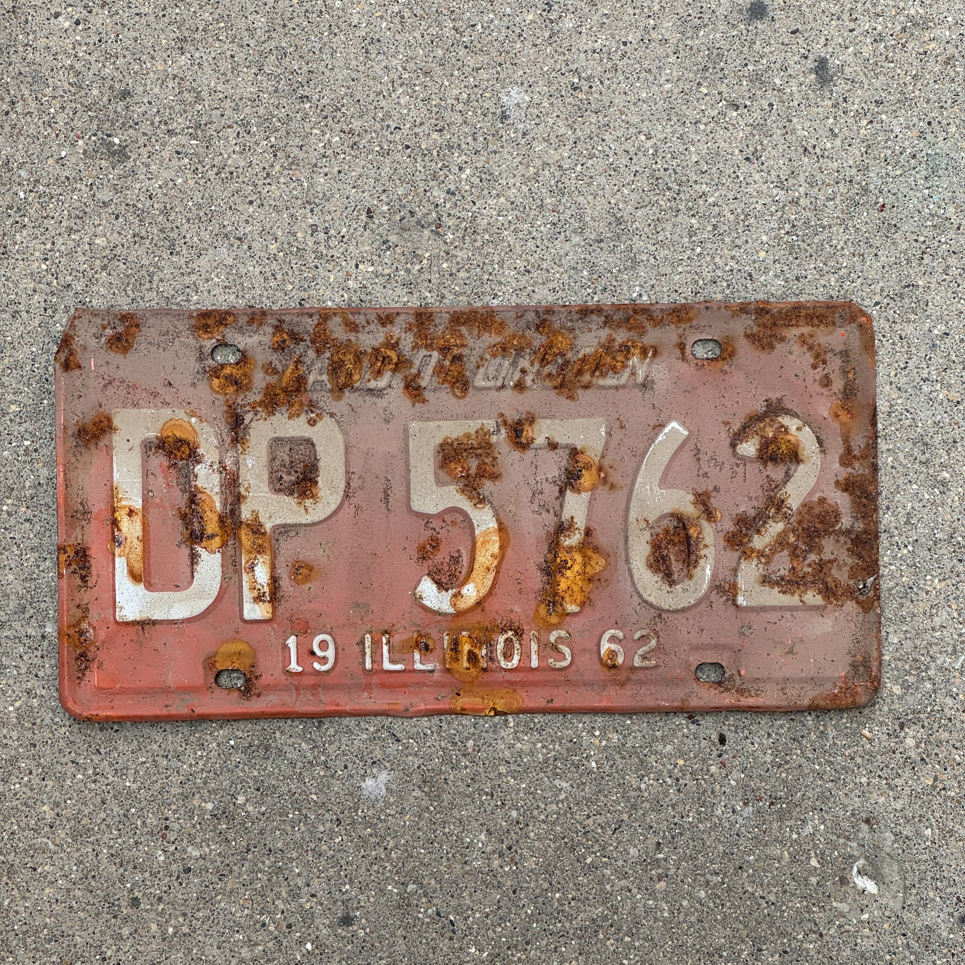 Photo of a 1962 Illinois License Plate Auto Tag 2 Vintage Garage DP 5762 with original patina