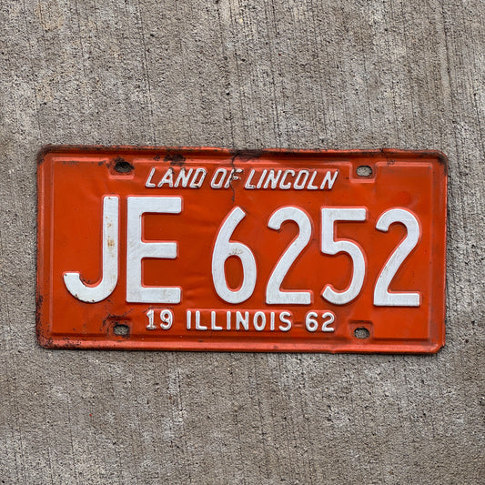 Photo of a 1962 Illinois License Plate Auto Tag 2 Vintage Garage JE 6252 with original patina