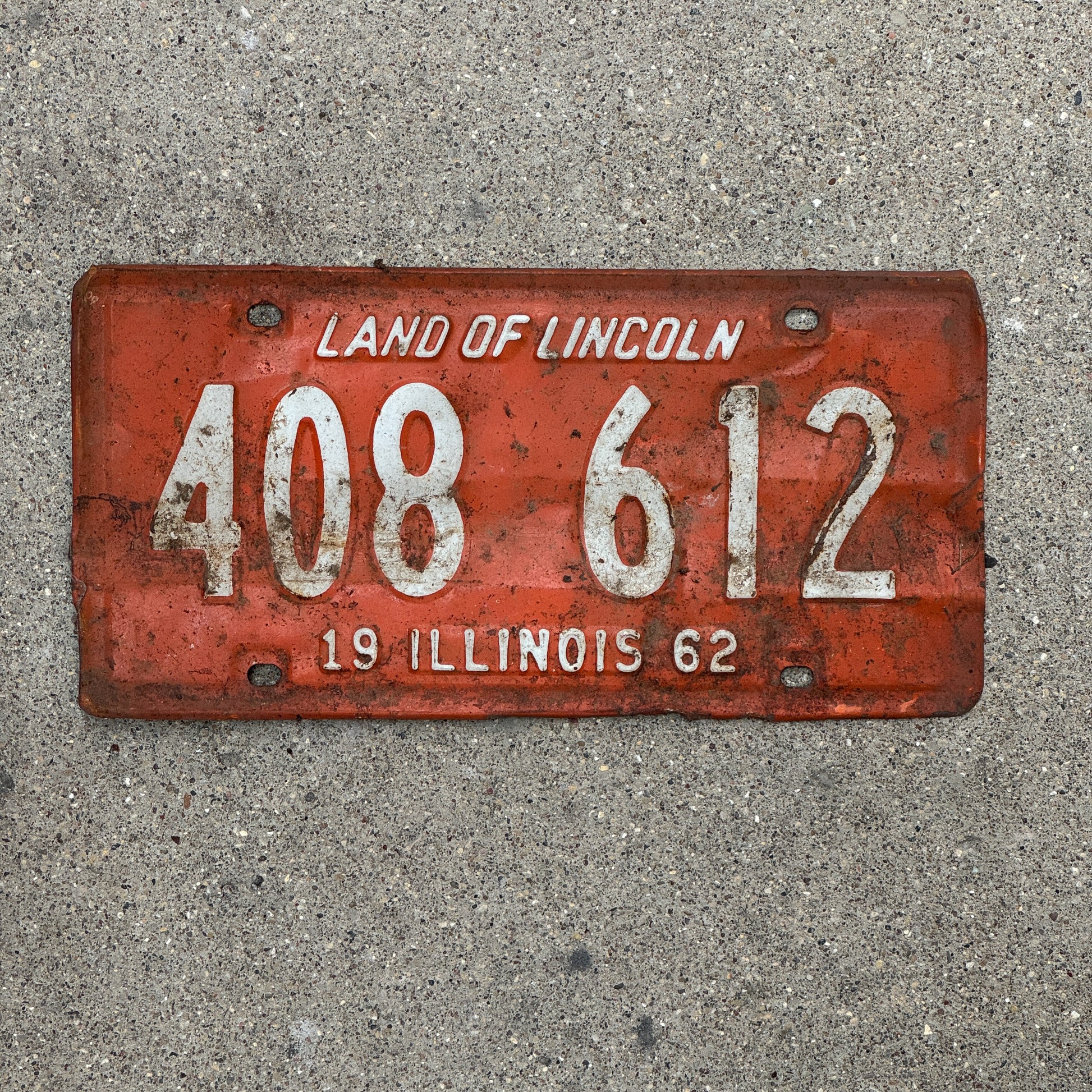 Photo of a 1962 Illinois License Plate Auto Tag Garage Decor Vintage 408 612 with original patina