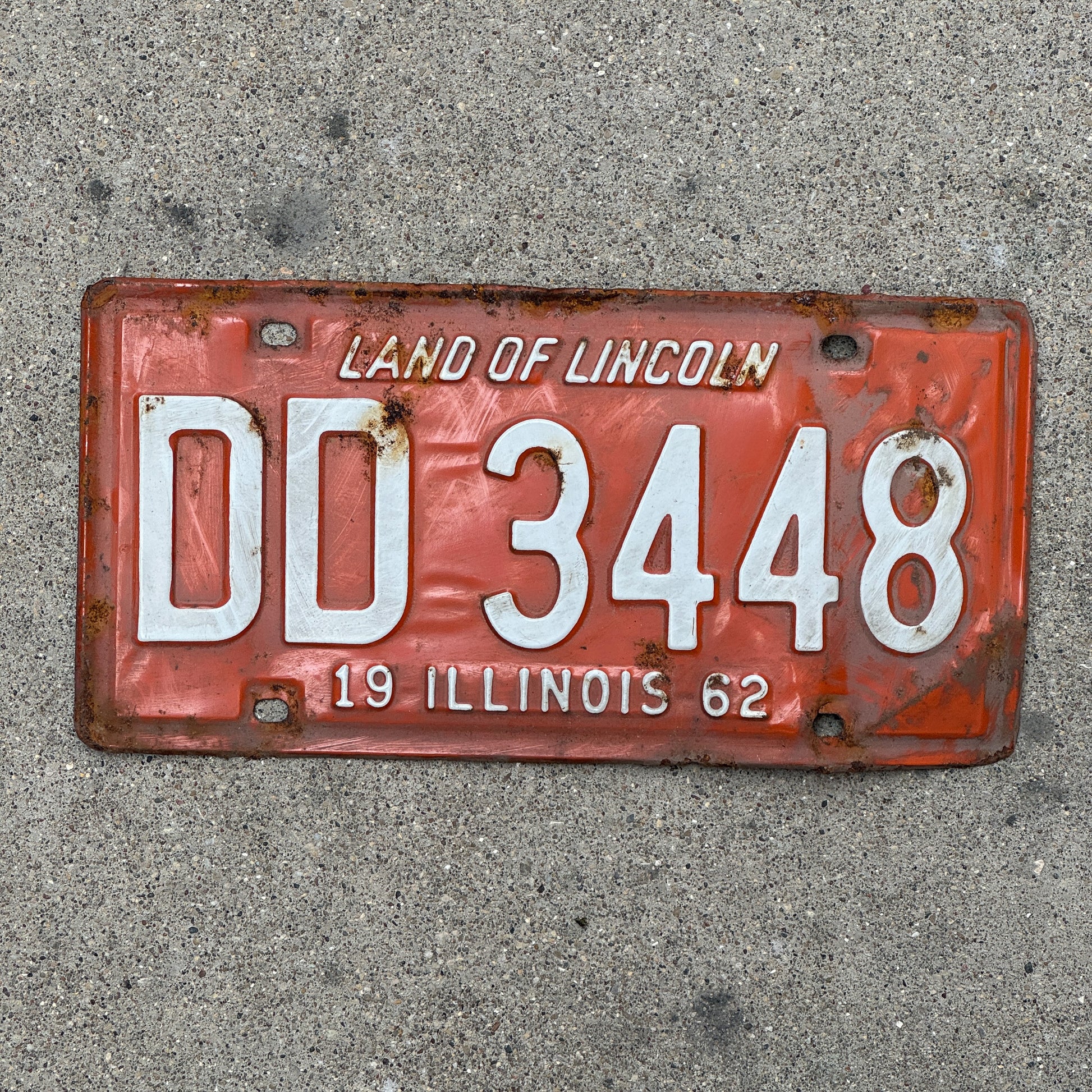 Photo of a 1962 Illinois License Plate Auto Tag Garage Decor Vintage DD 3448 with original patina