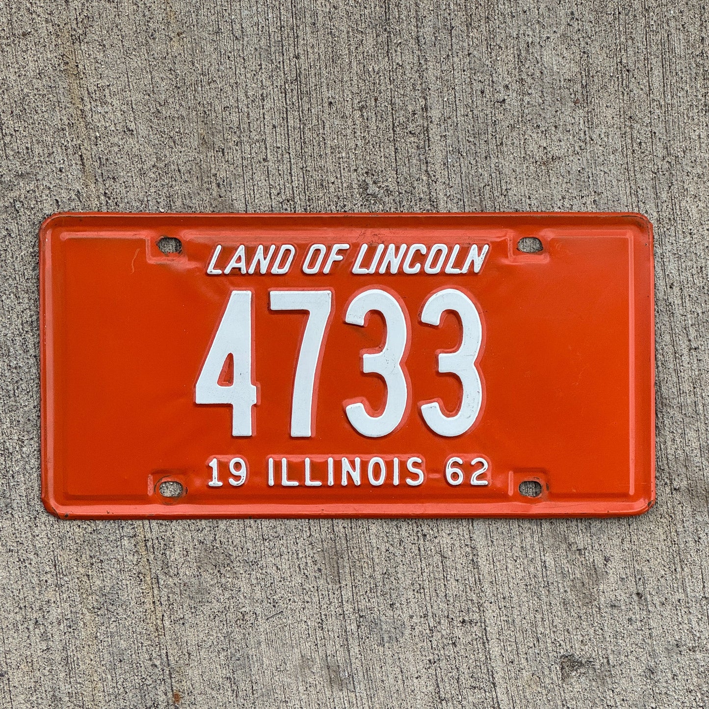 Photo of a 1962 Illinois License Plate Auto Tag Garage Decor Vintage Low Number Four Digit 4733 with original patina