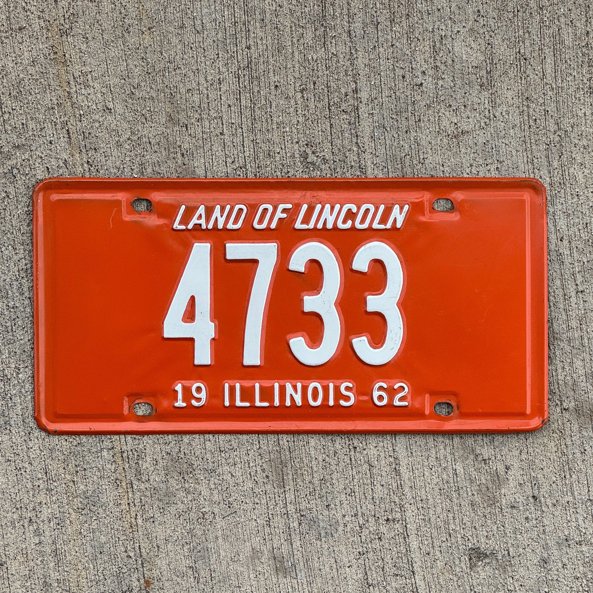 Photo of a 1962 Illinois License Plate Auto Tag Garage Decor Vintage Low Number Four Digit 4733 with original patina