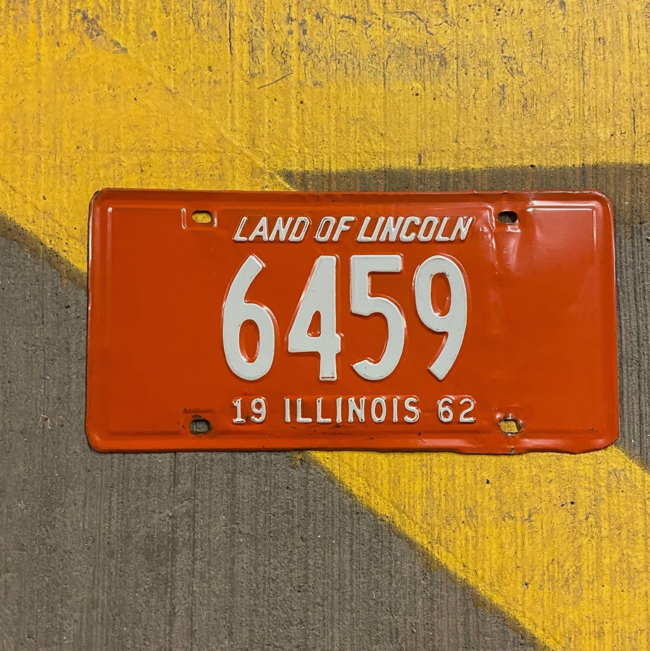 Photo of a 1962 Illinois License Plate Auto Tag Garage Decor Vintage Low Number Four Digit 6459 with original patina