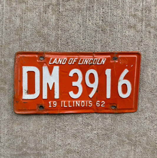 Photo of a 1962 Illinois License Plate Auto Tag Garage Decor Vintage Orange White DM 3916
