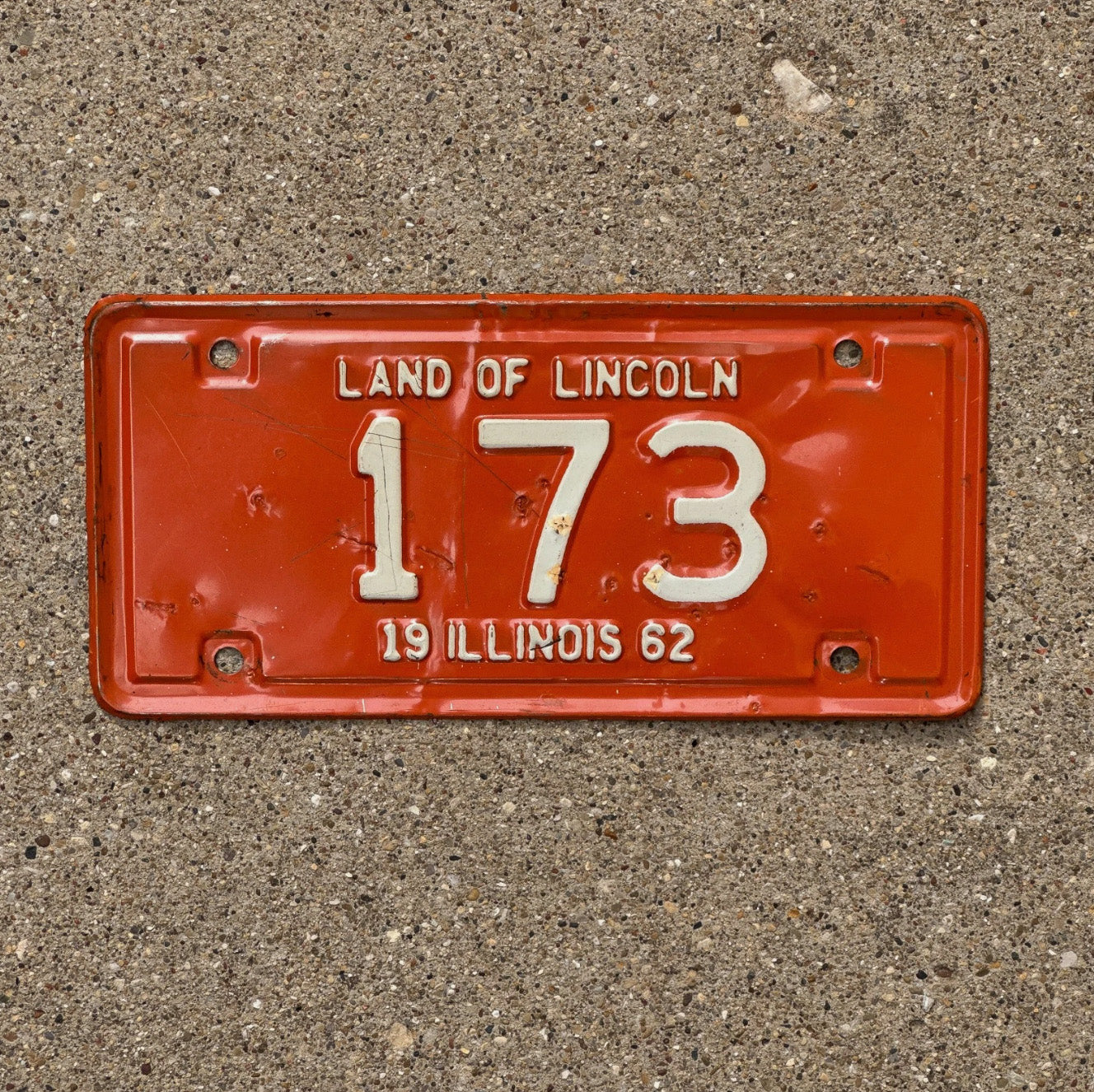 Photo of a 1962 Illinois Motorcycle License Plate Auto Tag Garage Decor Vintage Low Number Three Digit 173 with original patina
