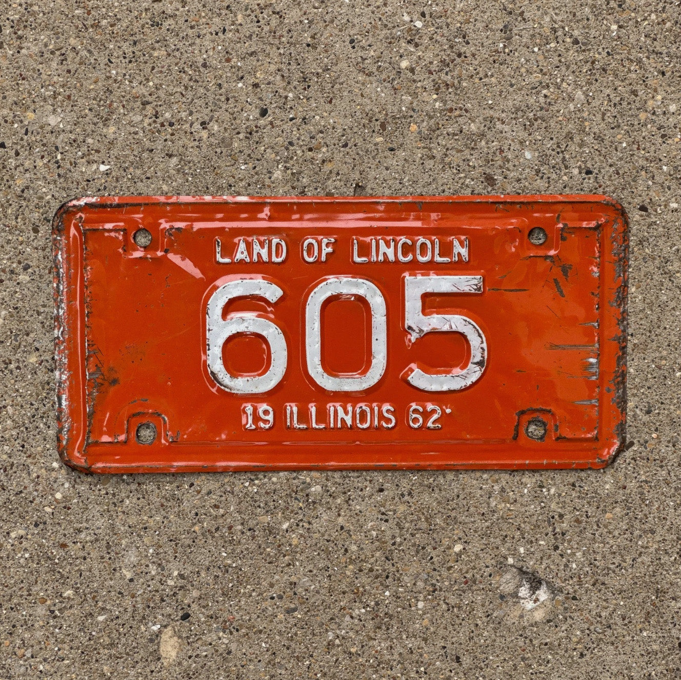 Photo of a 1962 Illinois Motorcycle License Plate Auto Tag Garage Decor Vintage Low Number Three Digit 605 with original patina