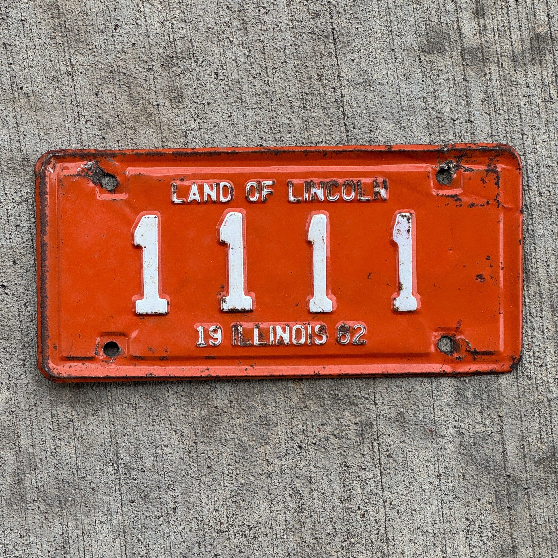 Photo of a 1962 Illinois Motorcycle License Plate Auto Tag Garage Decor Vintage Repeat Repeating 1111 with original patina