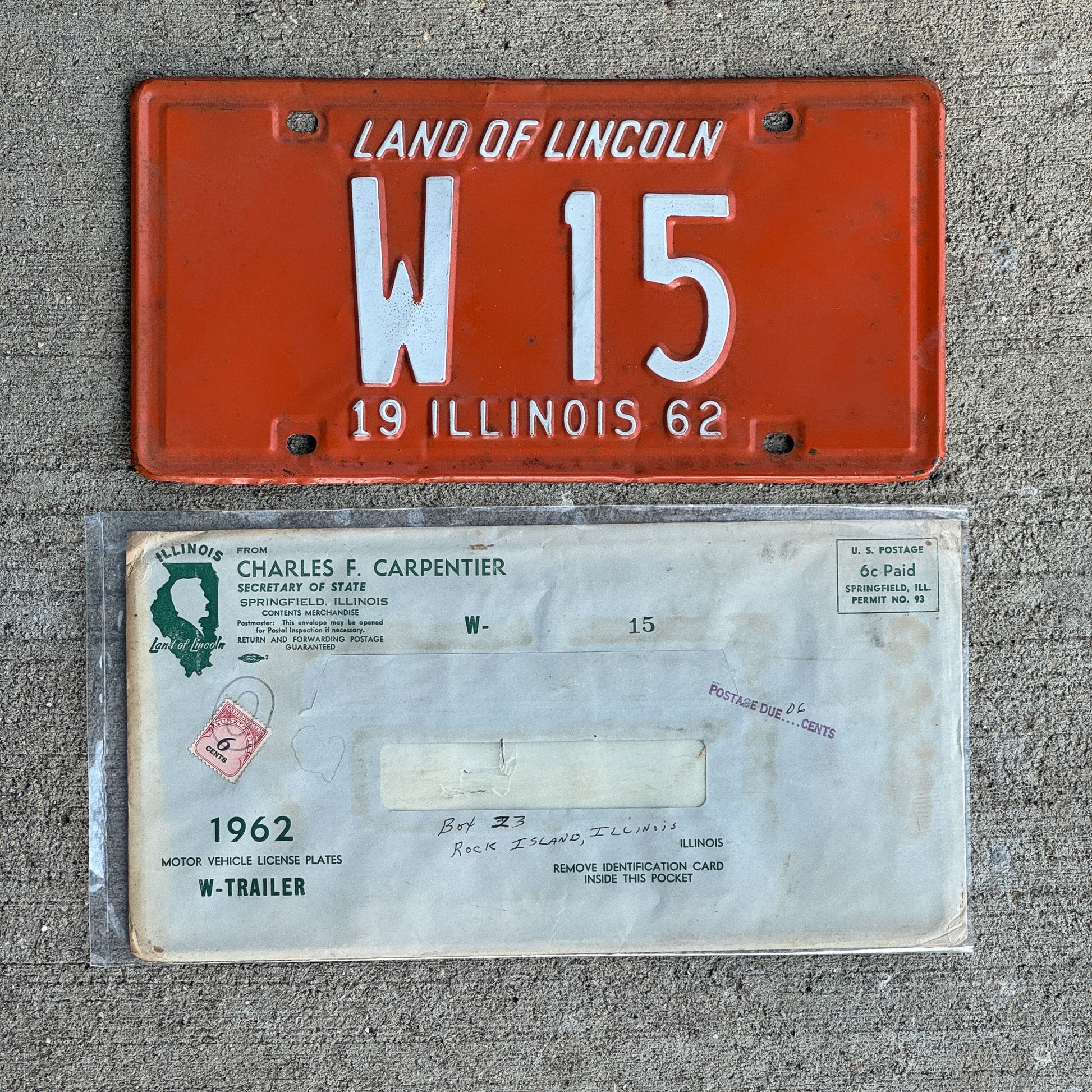 Photo of a 1962 Illinois Trailer License Plate Auto Tag Garage Decor Vintage Low Number Two Digit with Envelope W 15 with original patina