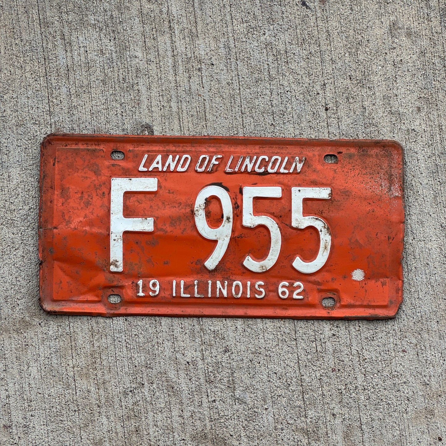 Photo of a 1962 Illinois Truck License Plate Auto Tag 2 Vintage Garage F 955 with original patina
