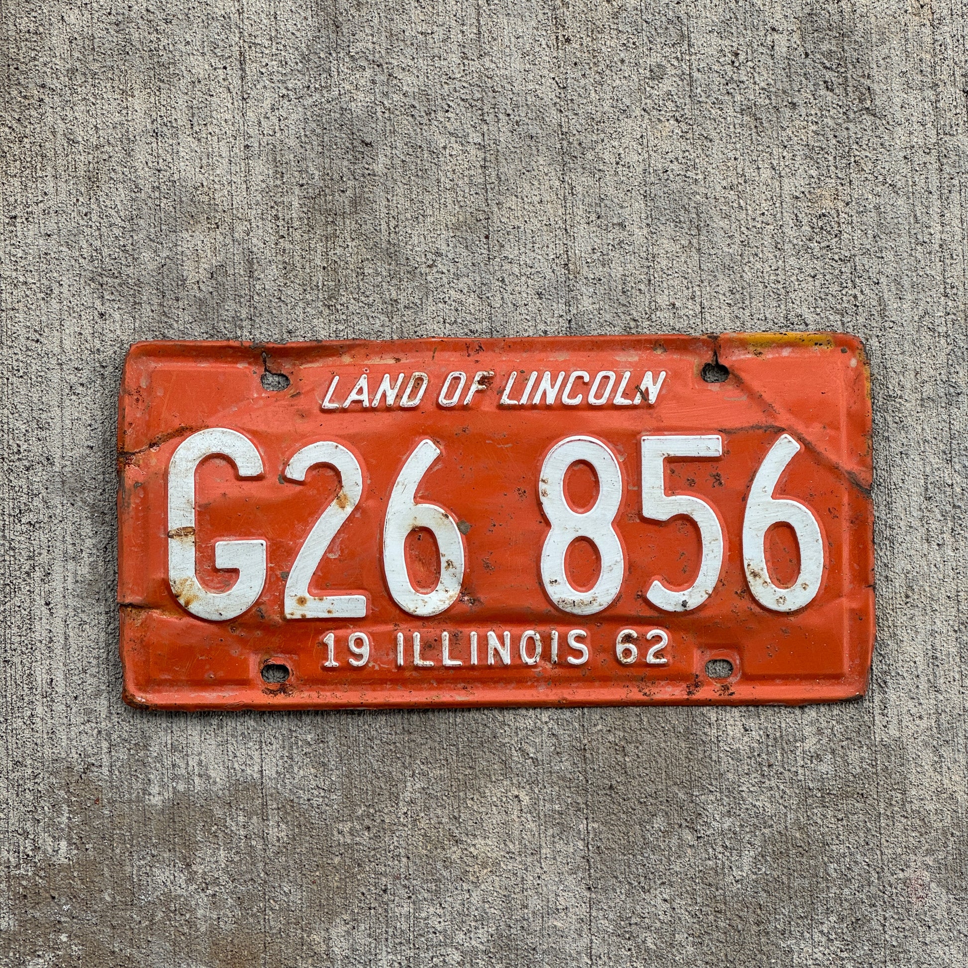 Photo of a 1962 Illinois Truck License Plate Auto Tag 2 Vintage Garage G 26 856 with original patina