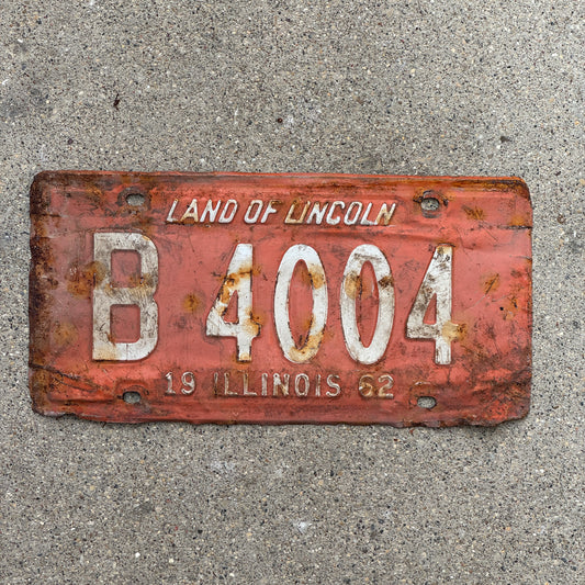 Photo of a 1962 Illinois Truck License Plate Auto Tag Garage Decor Vintage B 4004 with original patina