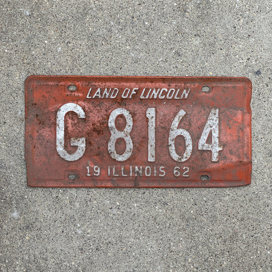 Photo of a 1962 Illinois Truck License Plate Auto Tag Garage Decor Vintage G 8164 with original patina