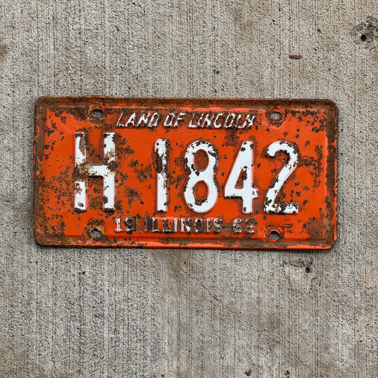 Photo of a 1962 Illinois Truck License Plate Auto Tag Garage Decor Vintage H 1842 with original patina