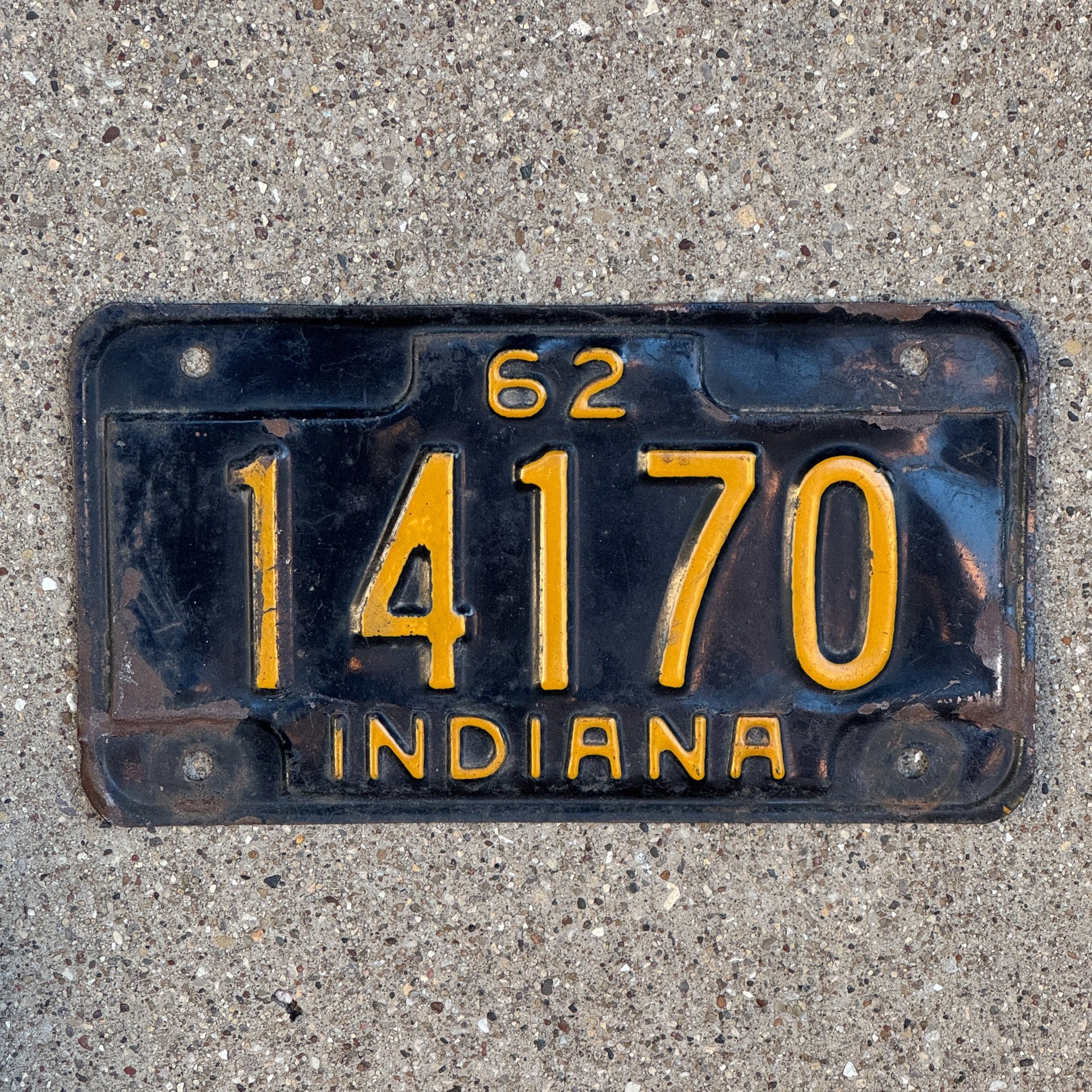 Photo of a 1962 Indiana Motorcycle License Plate Auto Tag Garage Decor Vintage 14170 with original patina