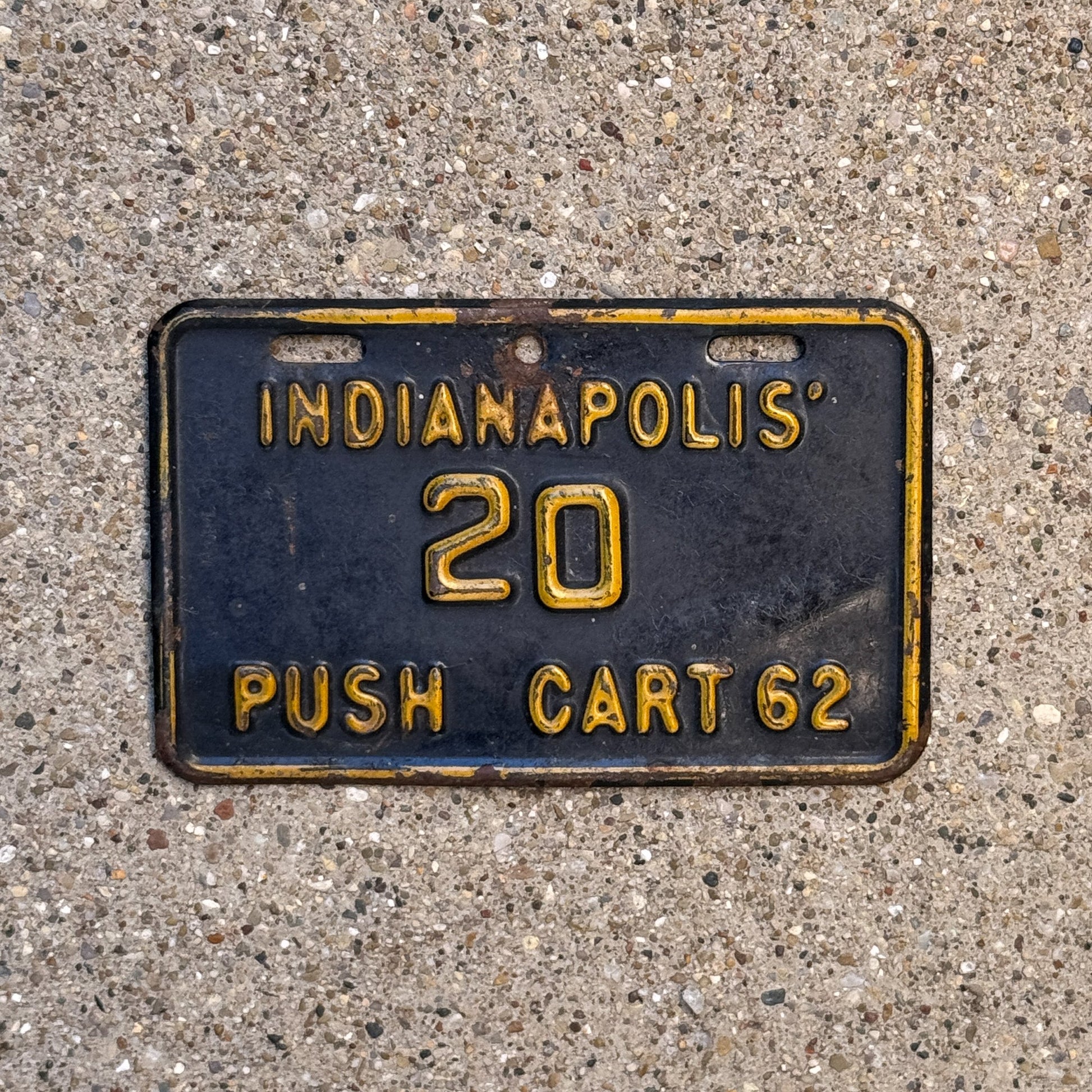 Photo of a 1962 Indiana Push Cart License Plate Auto Tag Garage Decor Vintage Indianapolis 20 with original patina