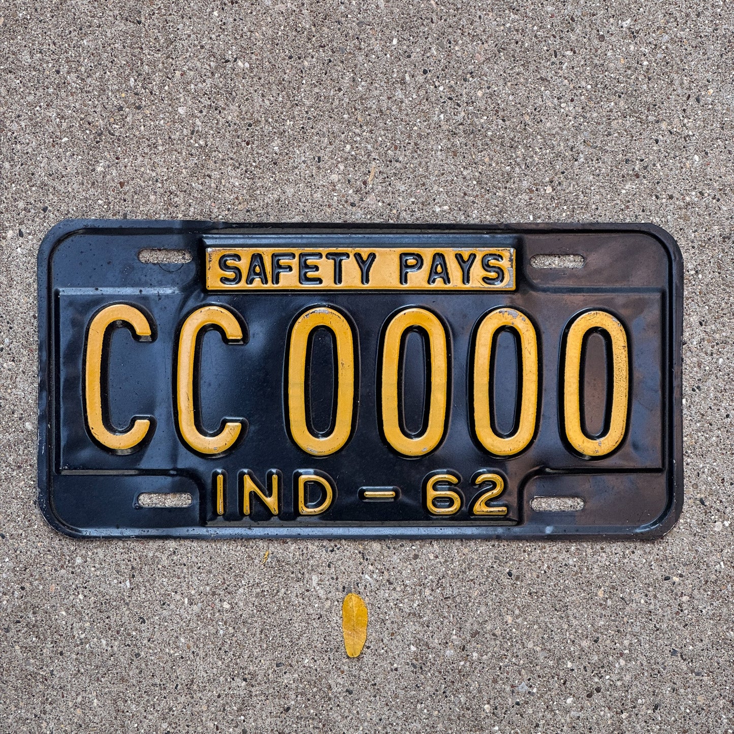 Photo of a 1962 Indiana Sample License Plate Auto Tag 1 Garage Decor CC 0000 with original patina