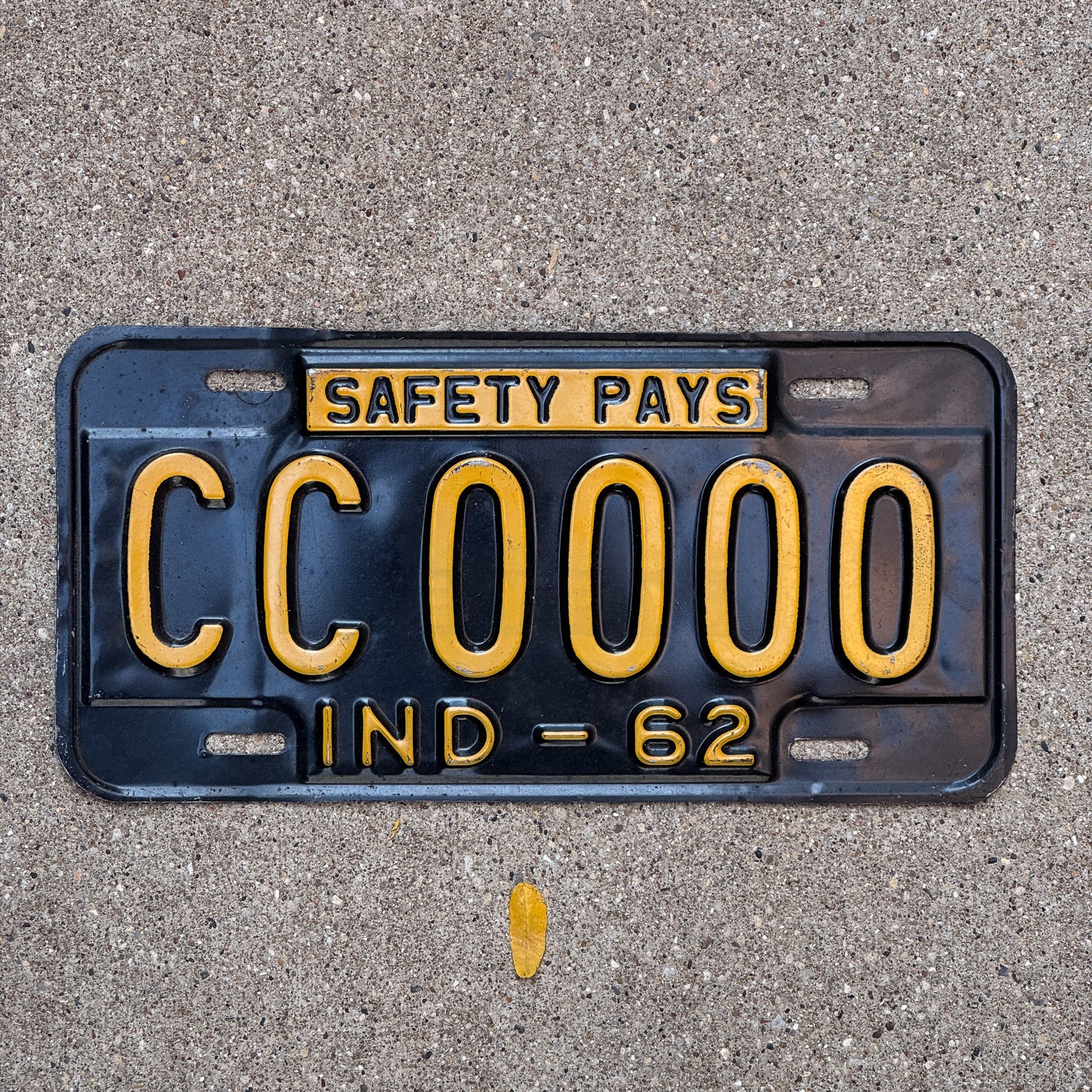 Photo of a 1962 Indiana Sample License Plate Auto Tag 1 Garage Decor CC 0000 with original patina