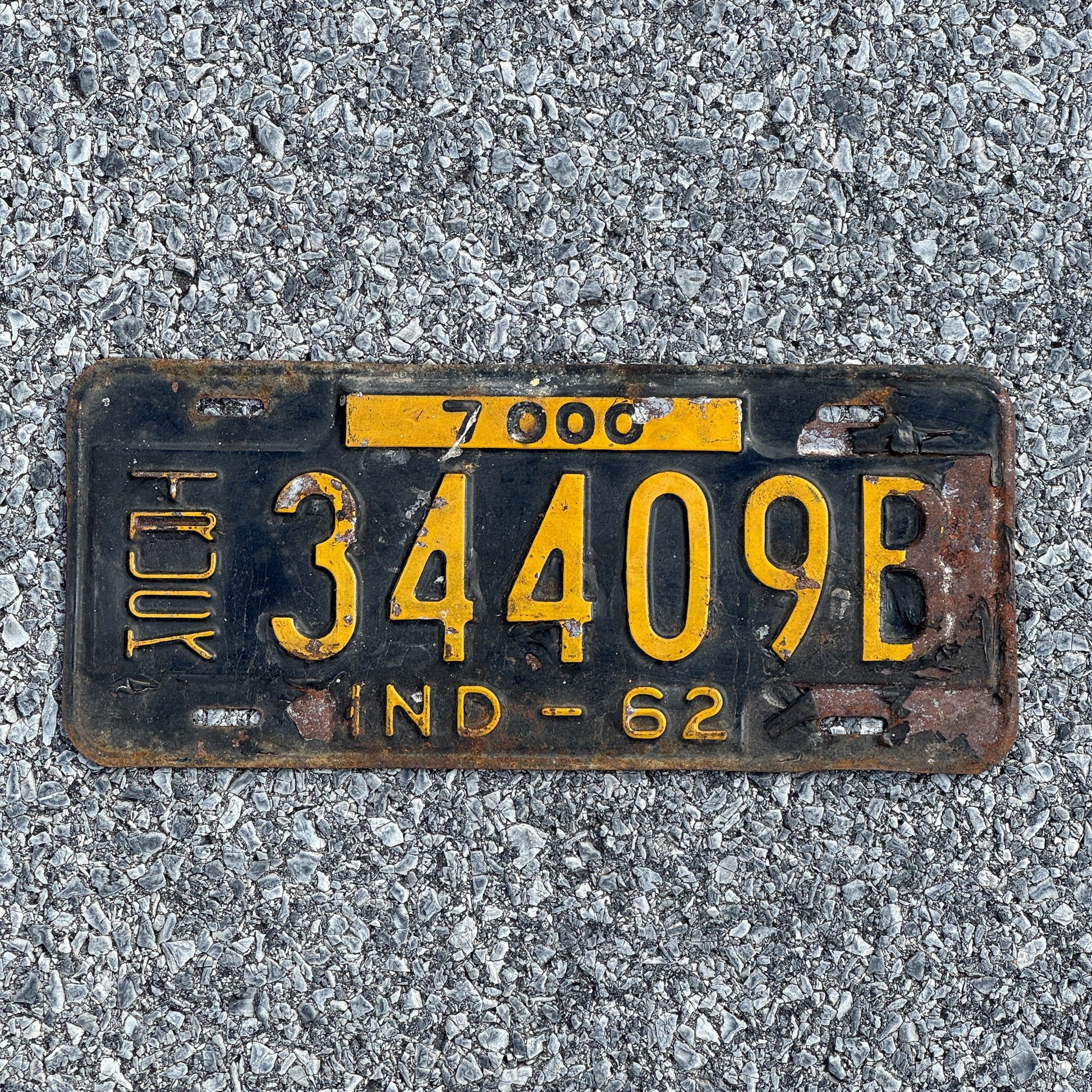 Photo of a 1962 Indiana Truck License Plate Auto Tag Garage Decor Vintage 34409B