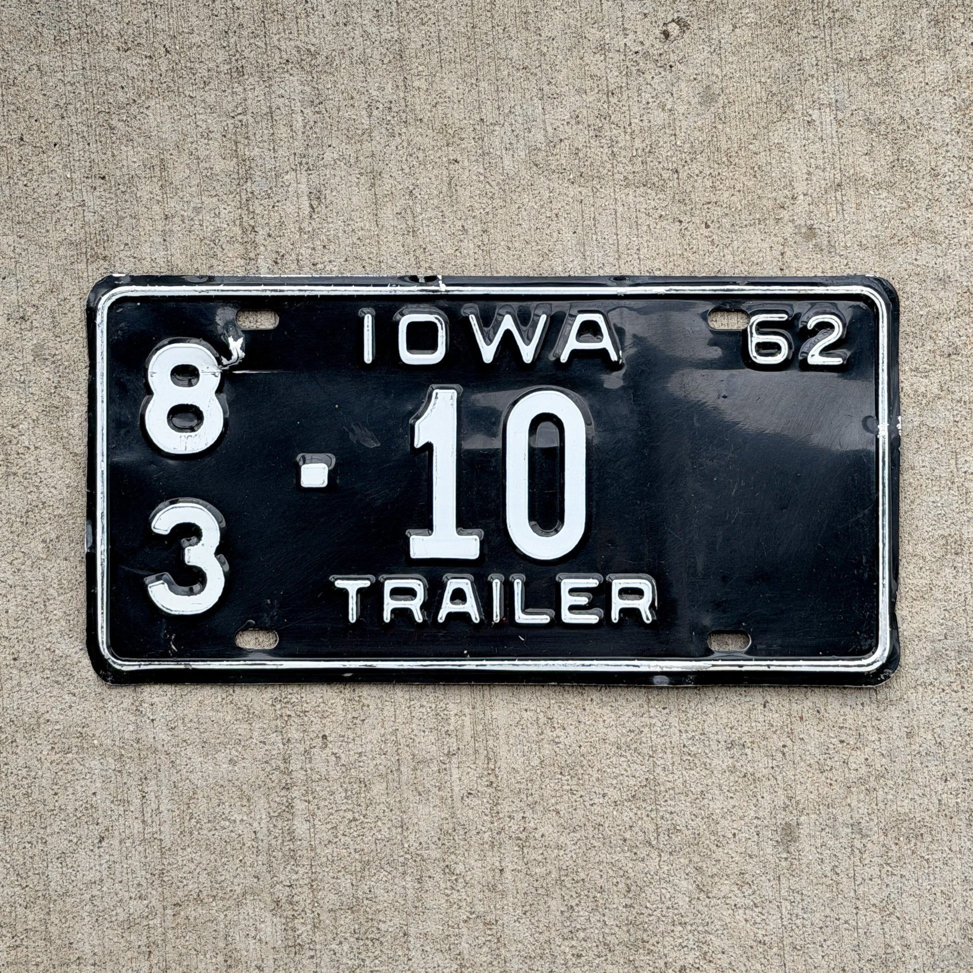 Photo of a 1962 Iowa Trailer License Plate Auto Tag Garage Decor Vintage 83 10 with original patina