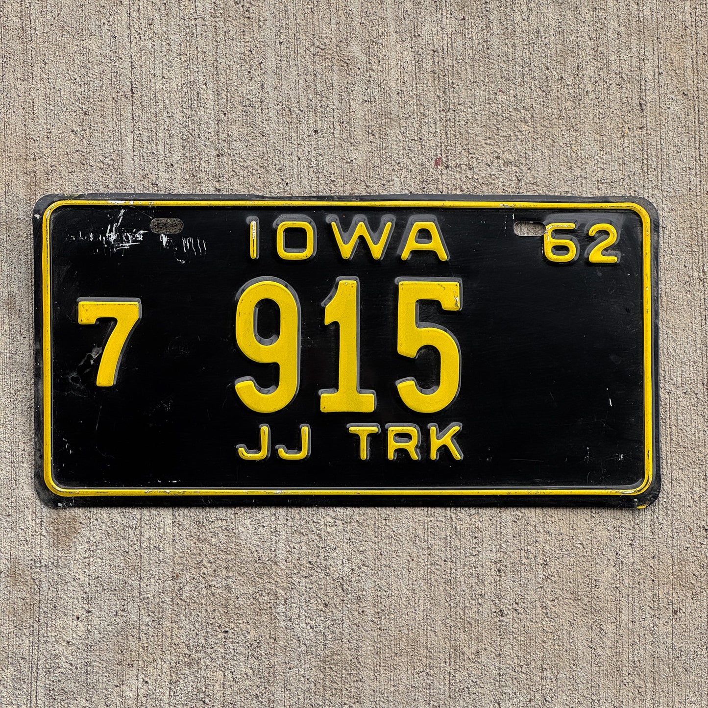 Photo of a 1962 Iowa Truck Half Year License Plate Auto Tag Garage Decor Vintage 7 915 with original patina