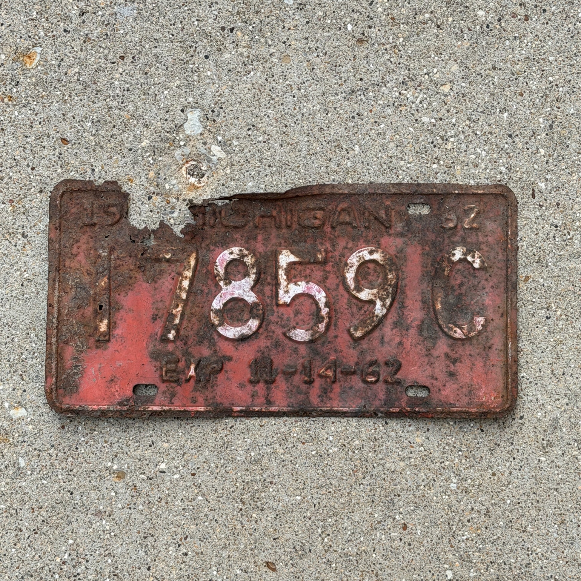Photo of a 1962 Michigan Commercial License Plate Auto Tag Garage Decor Vintage Half Year 17859 C with original patina