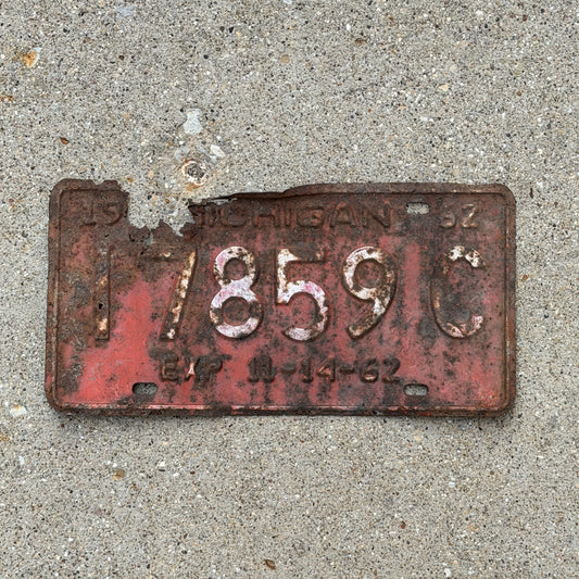 Photo of a 1962 Michigan Commercial License Plate Auto Tag Garage Decor Vintage Half Year 17859 C with original patina