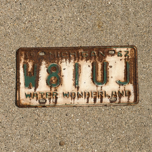 Photo of a 1962 Michigan Ham Radio License Plate Auto Tag Garage Decor Vintage W8 1 UJ with original patina