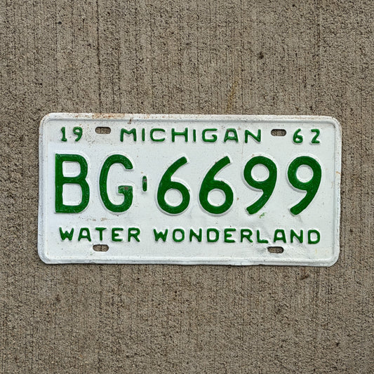 Photo of a 1962 Michigan License Plate Auto Tag Garage Decor Vintage BG 6699 with original patina