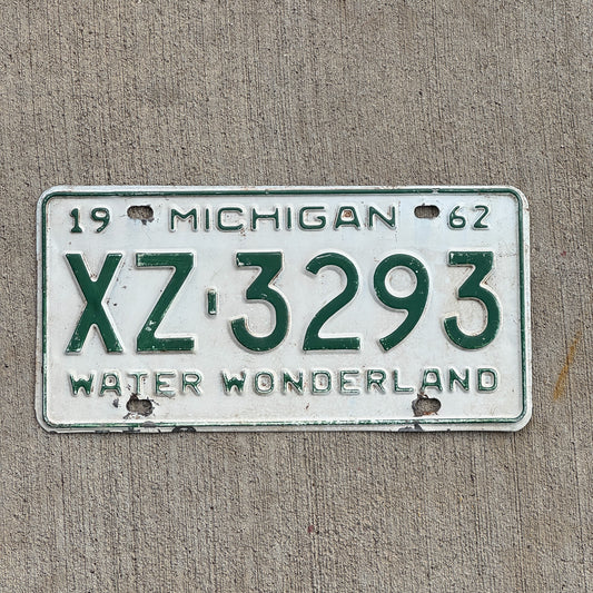 Photo of a 1962 Michigan License Plate Auto Tag Garage Decor Vintage Gogebic County XZ 3293 with original patina